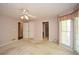 This bedroom features an en suite bathroom and large bay window at 2261 Byron Sw Ct, Marietta, GA 30064