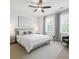 Minimalist bedroom featuring neutral tones, carpet flooring, and large windows for plenty of natural light at 558 Bismark Ne Rd, Atlanta, GA 30324