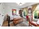 Bright bedroom with decorative elements and large windows bringing in natural light at 558 Bismark Ne Rd, Atlanta, GA 30324