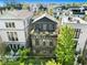Charming multi-story home boasts brick facade, lush greenery, and multiple outdoor spaces at 558 Bismark Ne Rd, Atlanta, GA 30324