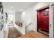 Hallway with an in-home elevator, hardwood floors, and a bright entrance at 558 Bismark Ne Rd, Atlanta, GA 30324