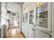 Butler's pantry showcasing glass-front cabinets and ample storage space at 558 Bismark Ne Rd, Atlanta, GA 30324