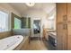 This is a spacious bathroom with double vanity, soaking tub, and glass-enclosed shower at 2270 Abbey Cove Ct, Marietta, GA 30062