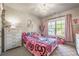 Adorable bedroom featuring a window for natural light and playful decor at 2270 Abbey Cove Ct, Marietta, GA 30062