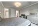 Bedroom with grey walls, carpet flooring, and silver accent furniture and decor at 2270 Abbey Cove Ct, Marietta, GA 30062
