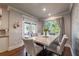 Charming dining area with a marble table, stylish chairs, and natural light at 2270 Abbey Cove Ct, Marietta, GA 30062