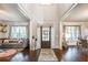 Bright and airy entryway with hardwood floors, a stylish rug, and views to adjacent living spaces at 2270 Abbey Cove Ct, Marietta, GA 30062