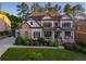 Attractive two-story home with well-maintained lawn, shrubbery, and inviting front porch at 2270 Abbey Cove Ct, Marietta, GA 30062