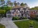 Stunning two-story home with stone accents, a well-manicured lawn, and an attached two-car garage at 2270 Abbey Cove Ct, Marietta, GA 30062