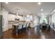 Open-concept kitchen with granite counters, stainless appliances, and a dining area with large windows at 2270 Abbey Cove Ct, Marietta, GA 30062