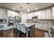 Modern kitchen with stainless steel appliances, granite countertops, and island seating at 2270 Abbey Cove Ct, Marietta, GA 30062