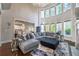 Spacious living room with soaring ceilings and a plush gray sectional sofa at 2270 Abbey Cove Ct, Marietta, GA 30062
