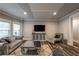 Relaxing living room featuring stylish sofas, wood-look floors, and modern decor at 2270 Abbey Cove Ct, Marietta, GA 30062