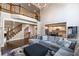 Open-concept living room with a view of the staircase and a modern fish tank at 2270 Abbey Cove Ct, Marietta, GA 30062