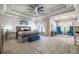 Spacious main bedroom featuring a tray ceiling, comfortable bedding, and elegant furniture at 2270 Abbey Cove Ct, Marietta, GA 30062