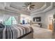 This is a spacious main bedroom features trey ceilings, large windows, and a sitting room at 2270 Abbey Cove Ct, Marietta, GA 30062