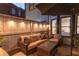 Cozy outdoor patio with comfortable seating, string lights, and shade umbrella at 2270 Abbey Cove Ct, Marietta, GA 30062