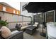 Back patio with comfortable seating, a hot tub, and privacy fence, ideal for relaxing outdoors at 2270 Abbey Cove Ct, Marietta, GA 30062