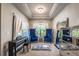 Bedroom sitting area offers natural light, piano, and comfortable seating at 2270 Abbey Cove Ct, Marietta, GA 30062