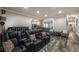 Home theater with leather recliners and decor, plus a glimpse to other rooms at 2270 Abbey Cove Ct, Marietta, GA 30062