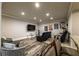 View of the home theater with seating and decor, open to the bar at 2270 Abbey Cove Ct, Marietta, GA 30062