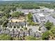 A pleasant aerial view shows the property neighborhood and a large school nearby at 2641 Se Parks Edge Se Dr, Smyrna, GA 30080