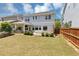 A well-maintained backyard featuring a covered patio and green lawn offers a serene outdoor space at 2641 Se Parks Edge Se Dr, Smyrna, GA 30080