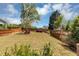 A spacious, fenced backyard with lush landscaping provides privacy and a tranquil outdoor retreat at 2641 Se Parks Edge Se Dr, Smyrna, GA 30080