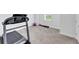 Carpeted basement area with fitness equipment and plenty of open space at 2641 Se Parks Edge Se Dr, Smyrna, GA 30080