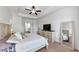 This primary bedroom boasts neutral decor, ample space, and an ensuite bathroom at 2641 Se Parks Edge Se Dr, Smyrna, GA 30080