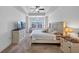 This bedroom features a dresser, nightstand, and a queen bed with neutral bedding at 2641 Se Parks Edge Se Dr, Smyrna, GA 30080