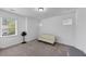 Simple bedroom with neutral carpet, good light, and minimalist furnishings at 2641 Se Parks Edge Se Dr, Smyrna, GA 30080