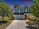 Charming two-story home featuring a well-manicured front yard and attached two-car garage at 2641 Se Parks Edge Se Dr, Smyrna, GA 30080