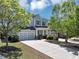 Charming two-story home featuring a well-manicured front yard and attached two-car garage at 2641 Se Parks Edge Se Dr, Smyrna, GA 30080