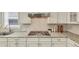 Modern kitchen has granite countertops, stainless steel appliances, and white cabinets at 2641 Se Parks Edge Se Dr, Smyrna, GA 30080