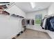 This walk-in closet boasts ample hanging and storage space for clothes and shoes at 2641 Se Parks Edge Se Dr, Smyrna, GA 30080