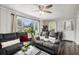 Inviting living room with a comfy sofa and natural light, complete with views of the outdoors at 4061 Newman Ellis Rd, Douglasville, GA 30134