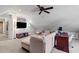 Relaxing bonus room with sloped ceilings, TV, desk area, and comfortable seating at 2106 Berryhill Se Cir, Smyrna, GA 30082