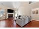 Spacious living room with hardwood floors, fireplace, and plenty of natural light at 2106 Berryhill Se Cir, Smyrna, GA 30082