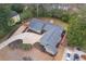 Aerial view of property highlighting roof, driveway and landscaping at 350 Somerset Se Ln, Marietta, GA 30067