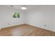 Bright bedroom with hardwood flooring and a large window allowing for natural light at 350 Somerset Se Ln, Marietta, GA 30067