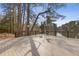 Spacious deck overlooking a serene lake, perfect for outdoor entertaining and relaxation at 350 Somerset Se Ln, Marietta, GA 30067