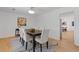 Elegant dining room featuring wainscoting, modern rug, and contemporary decor at 350 Somerset Se Ln, Marietta, GA 30067