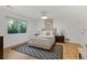Bright main bedroom featuring a view to the trees and contemporary decor at 350 Somerset Se Ln, Marietta, GA 30067