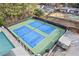 Aerial view of community tennis courts and surrounding greenery at 350 Somerset Se Ln, Marietta, GA 30067