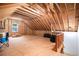 Unfinished attic space with exposed wood beams, ready to be converted at 469 Kimberly Ct, Mcdonough, GA 30252