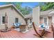 Relaxing deck featuring comfortable outdoor seating, a hammock, and lush green surroundings at 469 Kimberly Ct, Mcdonough, GA 30252