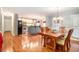 Dining room with hardwood floors and views of kitchen at 469 Kimberly Ct, Mcdonough, GA 30252