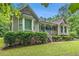 Charming home featuring well-manicured landscaping and a cozy covered front porch at 469 Kimberly Ct, Mcdonough, GA 30252