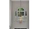 A bright foyer with a decorative light fixture and window at 513 Huntgate Rd, Woodstock, GA 30189